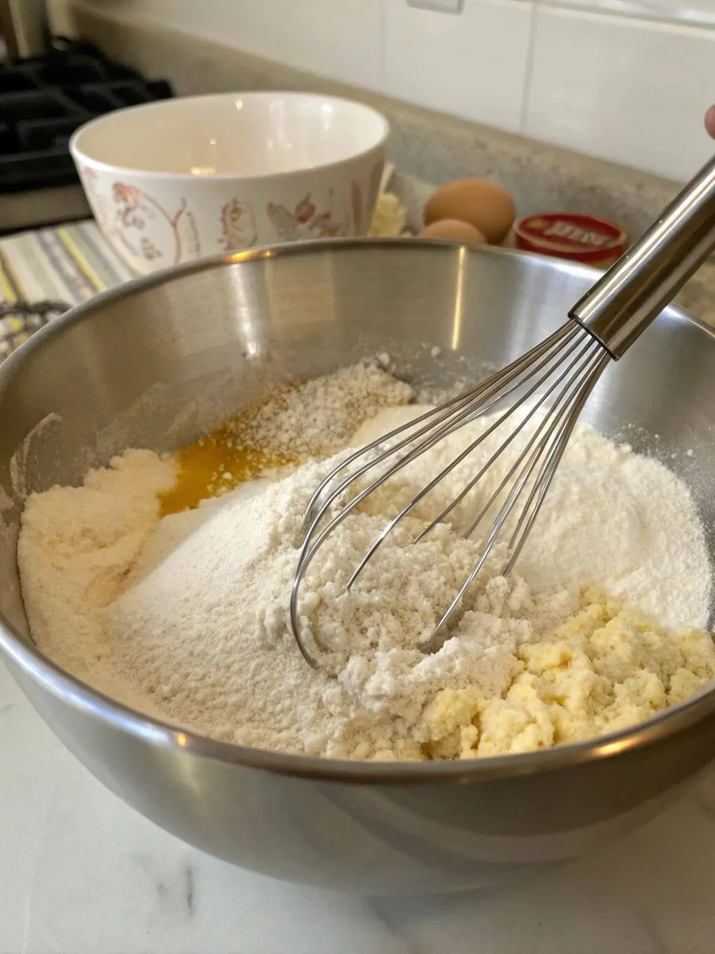 mix-the-dry-ingredients--in-a-large-bowl--whisk-to Whisking ingredients in a bowl for vegan pasta dough